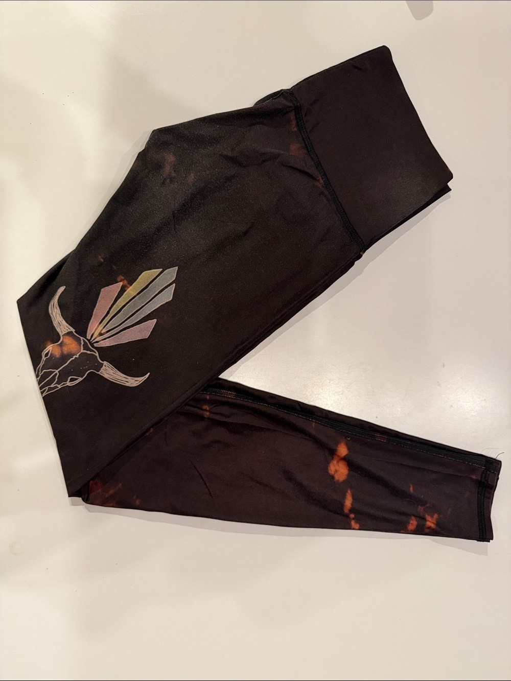 teeki Black Leggings with Orange Tie-Dye and Pastel Skull Accent